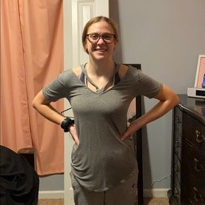 Tee shirt with cut shoulders